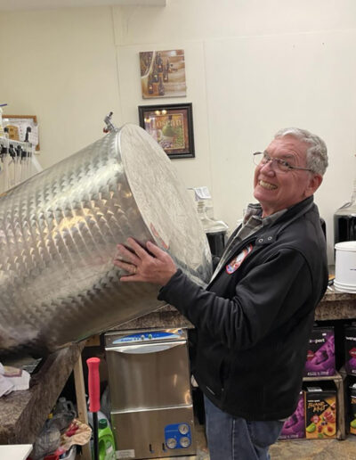 Bill, our favorite volunteer, helping to bottle wine