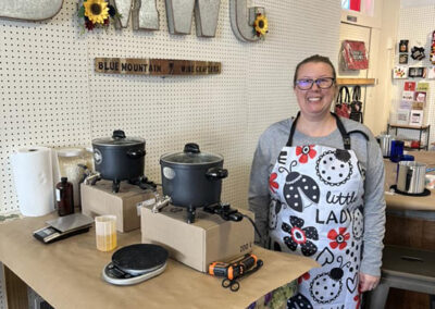 Katie from Ladybug Acres with the candle making setup